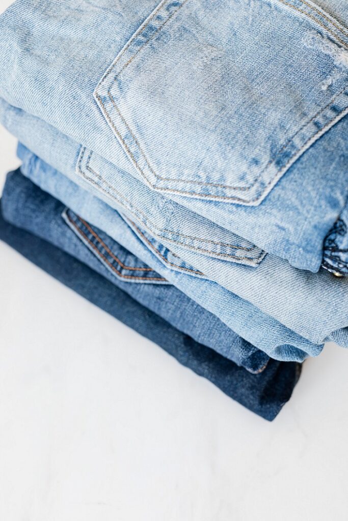 Photo by Karolina Grabowska: https://www.pexels.com/photo/stack-of-jeans-on-white-marble-surface-4210857/